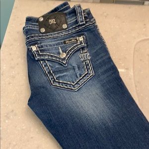 Miss Me signature boot cut jeans.